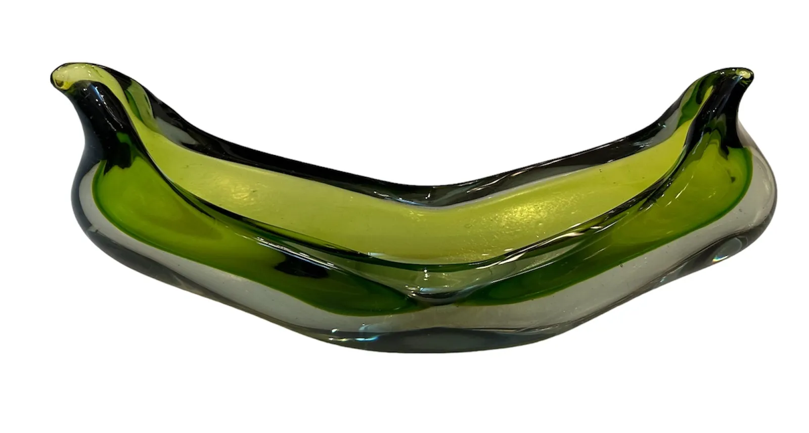 antique murano glass with wavy shape and green color