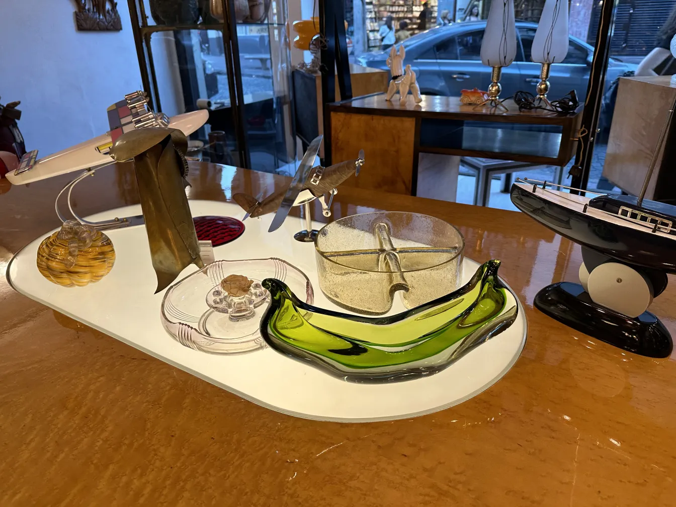 Decorative antique Murano glass in green banana shape with other items