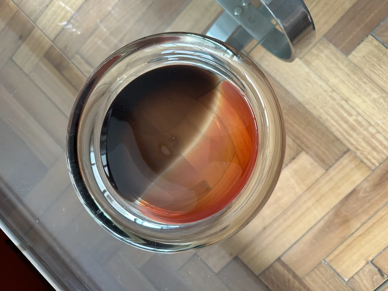 top view of an antique murano glass vase with dark colors