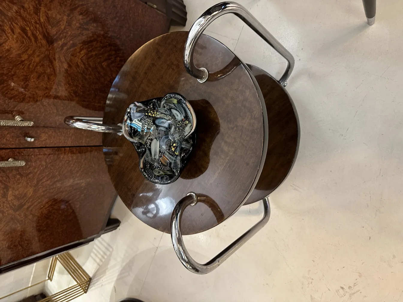 detail of an antique murano glass with striking design on a table