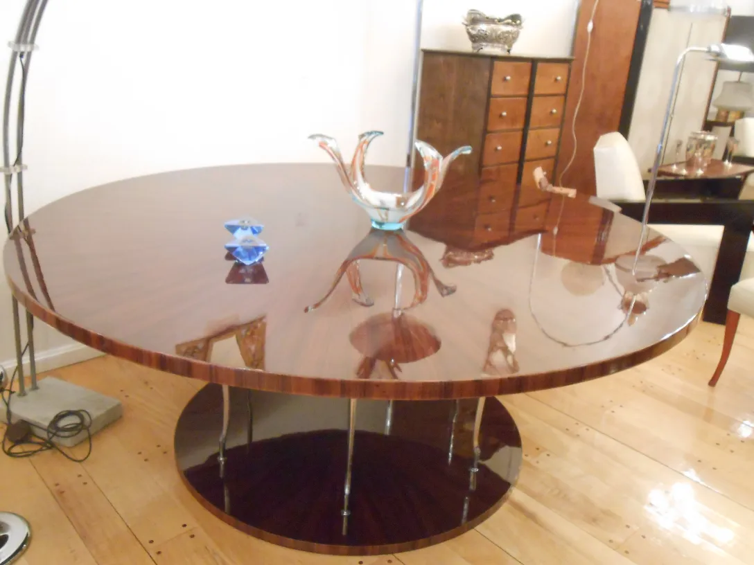 decorative murano glass blue piece on round wooden table