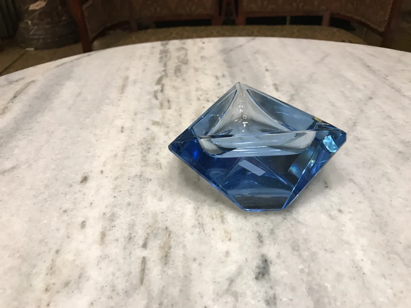 blue murano glass piece in diamond shape