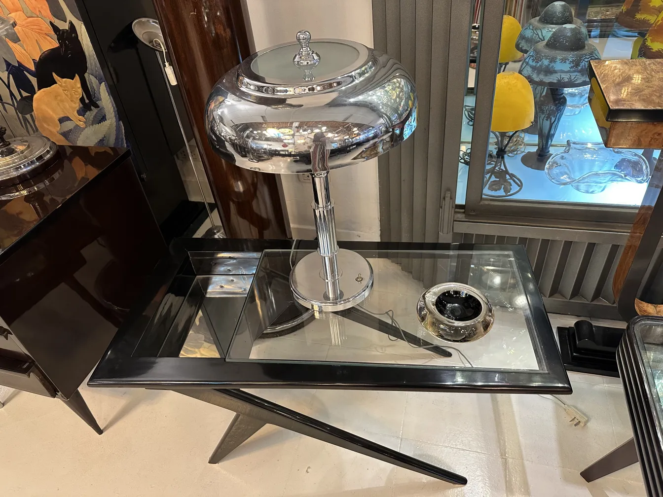 antique murano glass on a table with a lamp