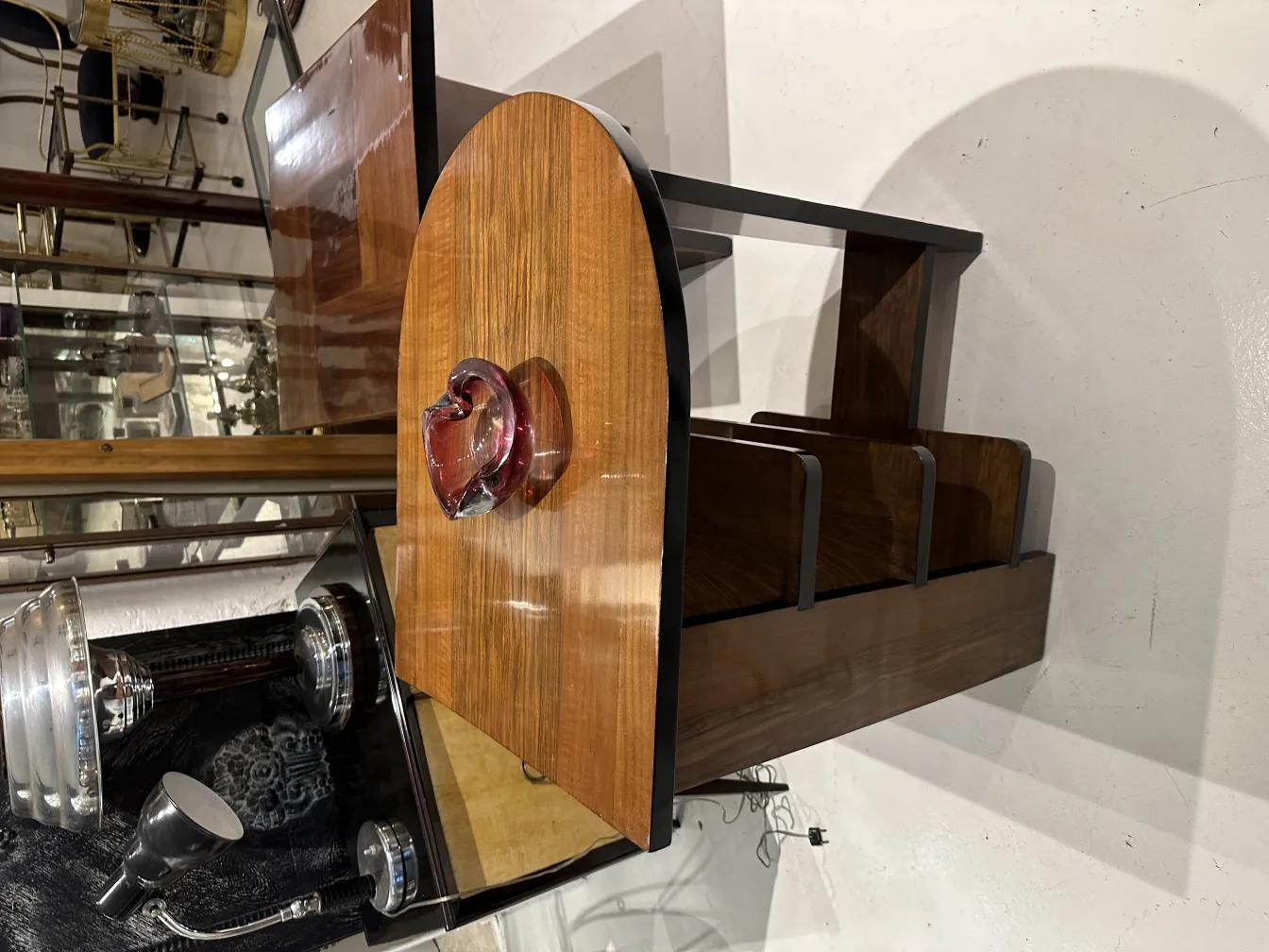 red murano glass heart on a wooden base