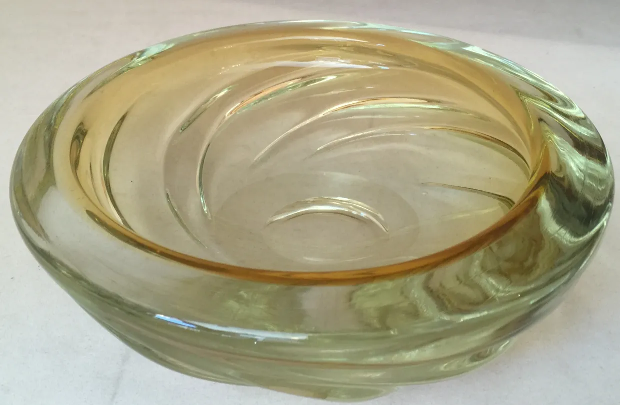 antique murano glass decorative bowl in yellow and green tones featuring a circular design