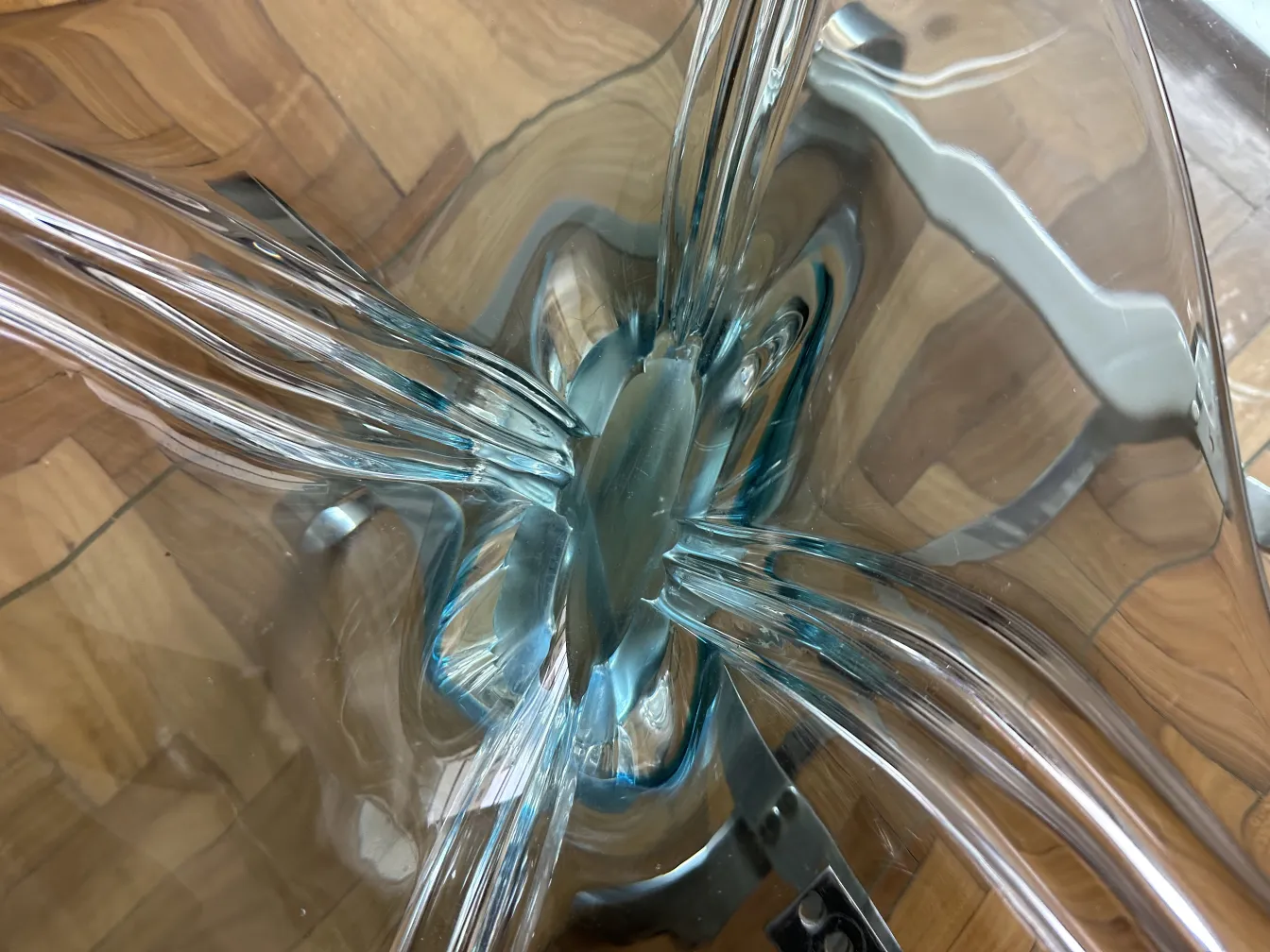 antique murano glass with elegant design and flowing shapes, in a cozy environment