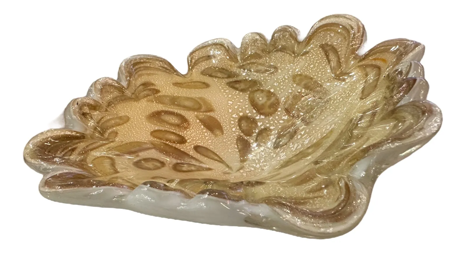 Murano glass bowl, golden color with floral details, classic ambiance.