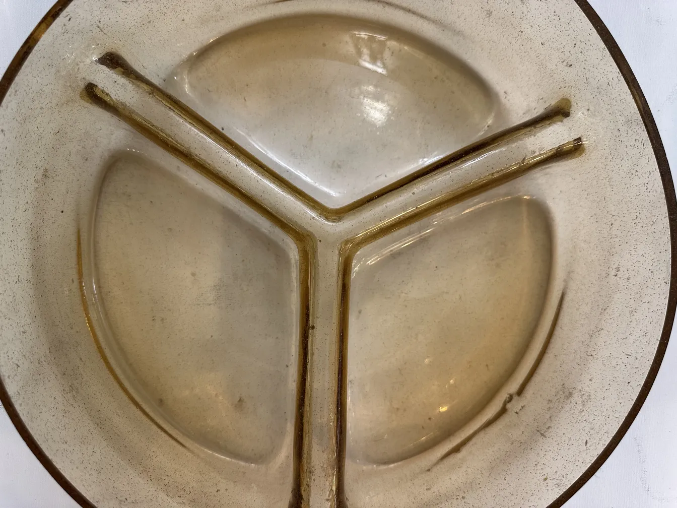 antique murano glass dish in light tones, elegant design.