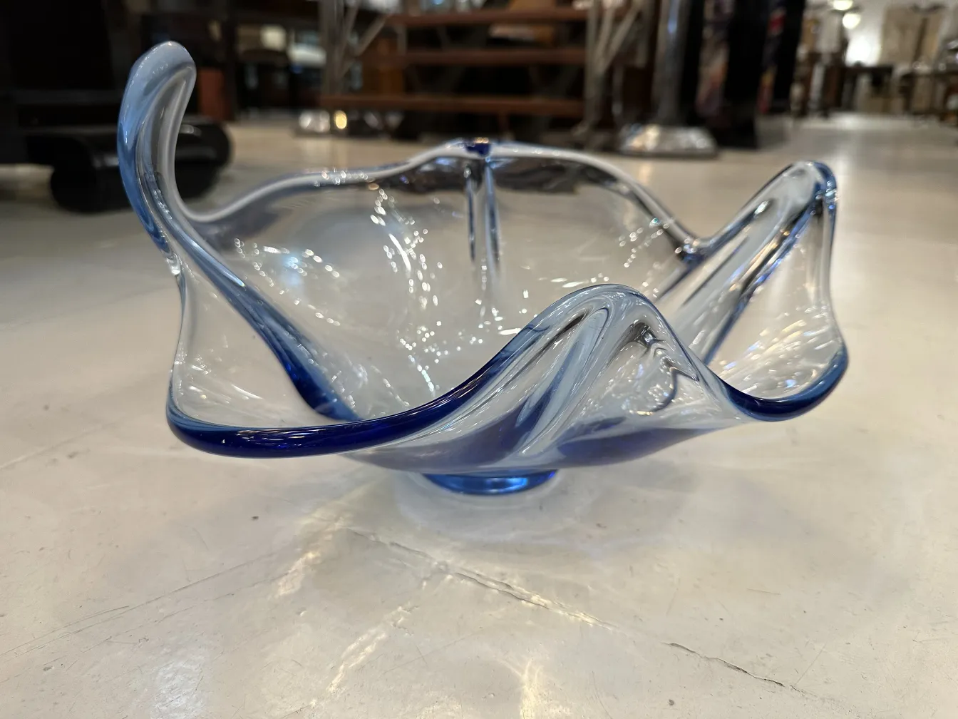 murano glass piece in blue with wavy shapes