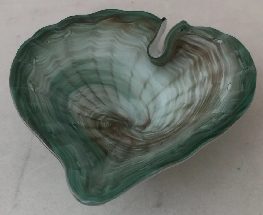 beautiful antique leaf-shaped murano glass piece with green and brown tones