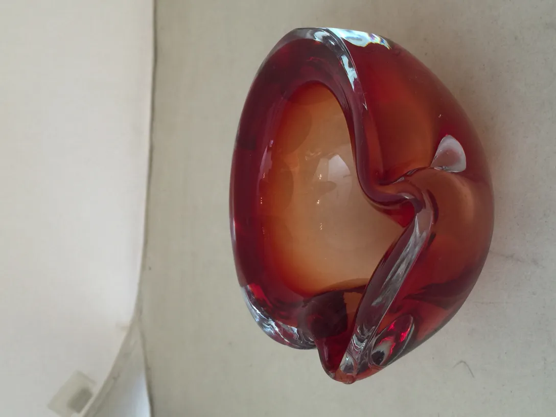 elegant antique murano glass with distinctive shape and red combinations