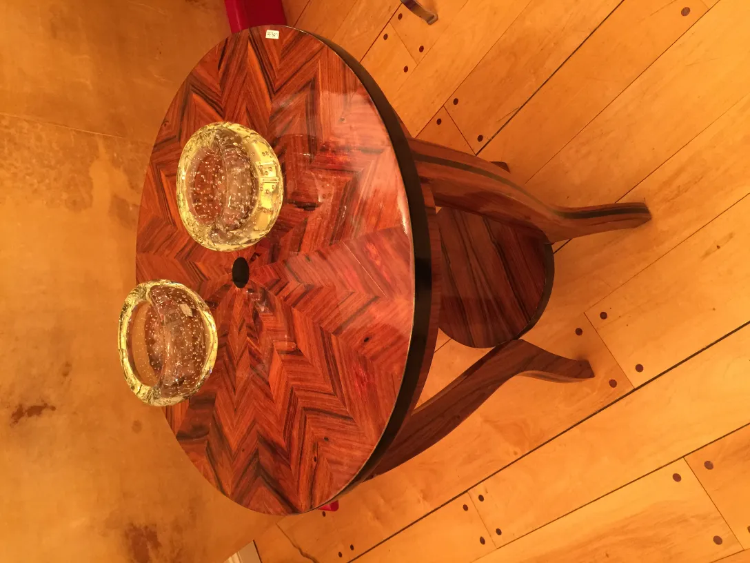 two murano glass bowls on wooden table
