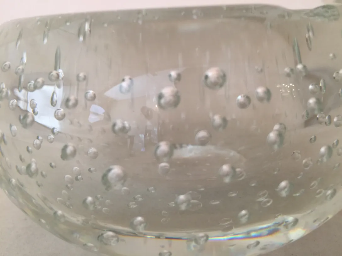 Bowl of murano glass featuring bubbles inside