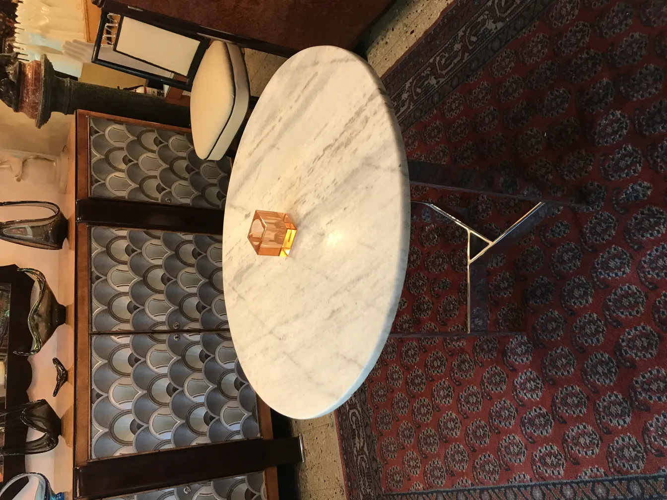 Antique Murano glass cube on a marble table