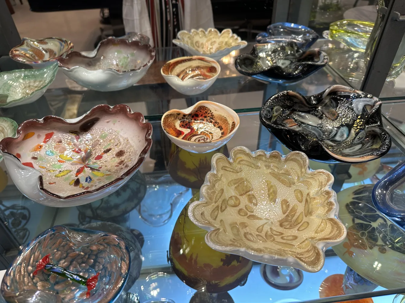 antique decorative bowl of murano glass, vibrant colors, various shapes