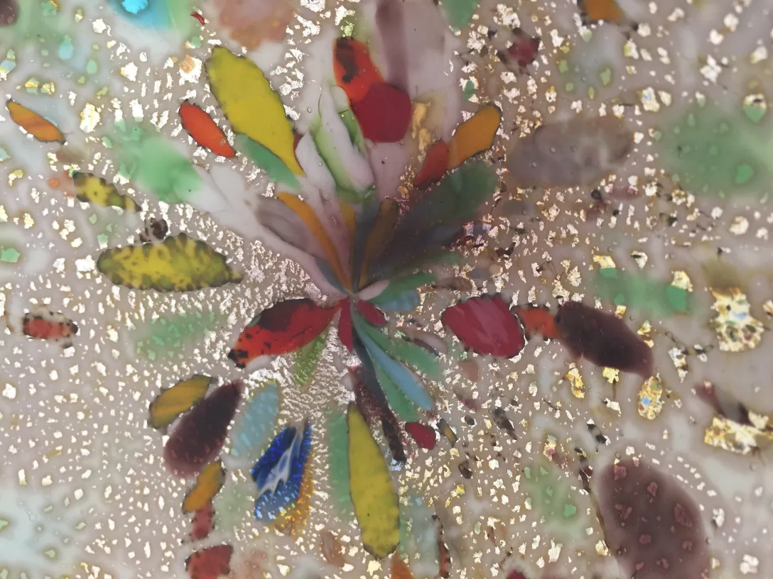 Colorful antique Murano glass with vibrant and golden details