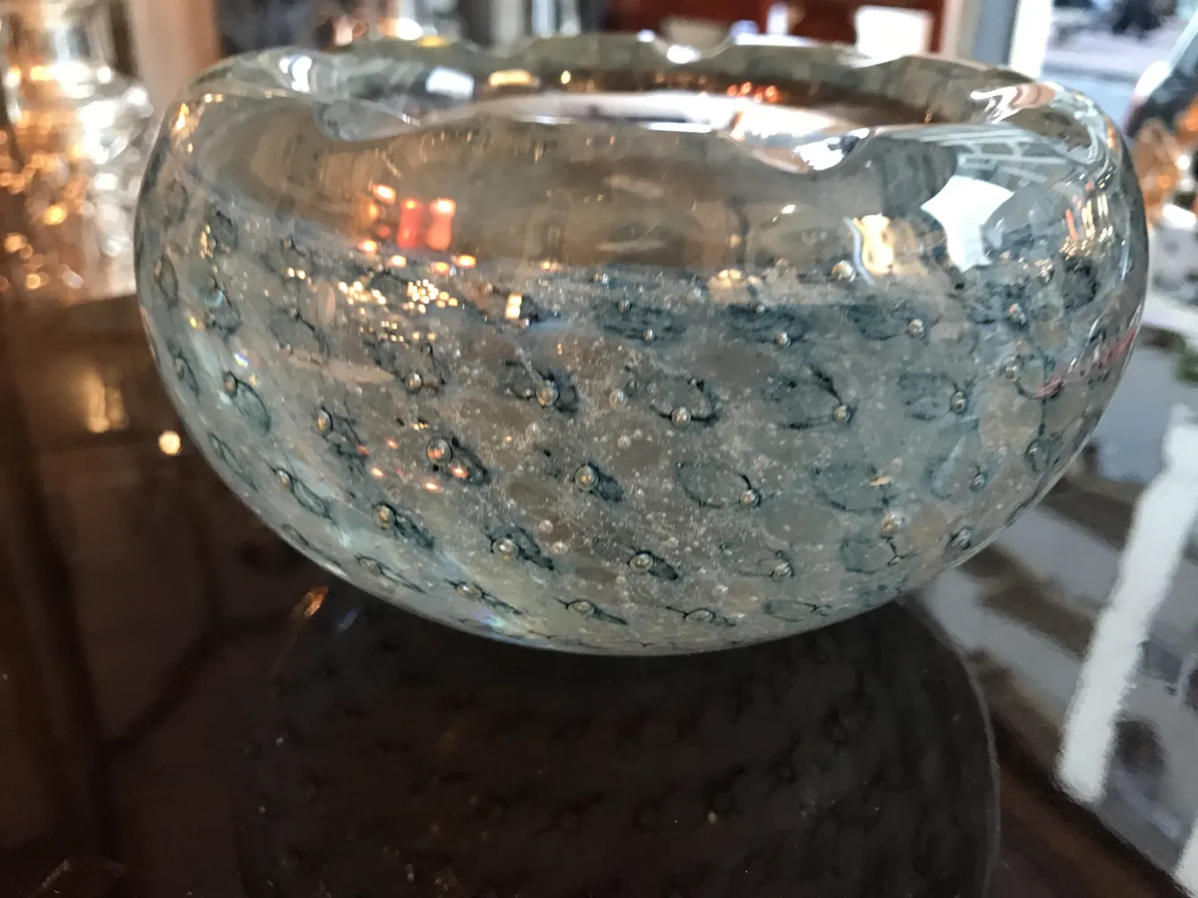 murano glass bowl with decorative bubbles and blue tones