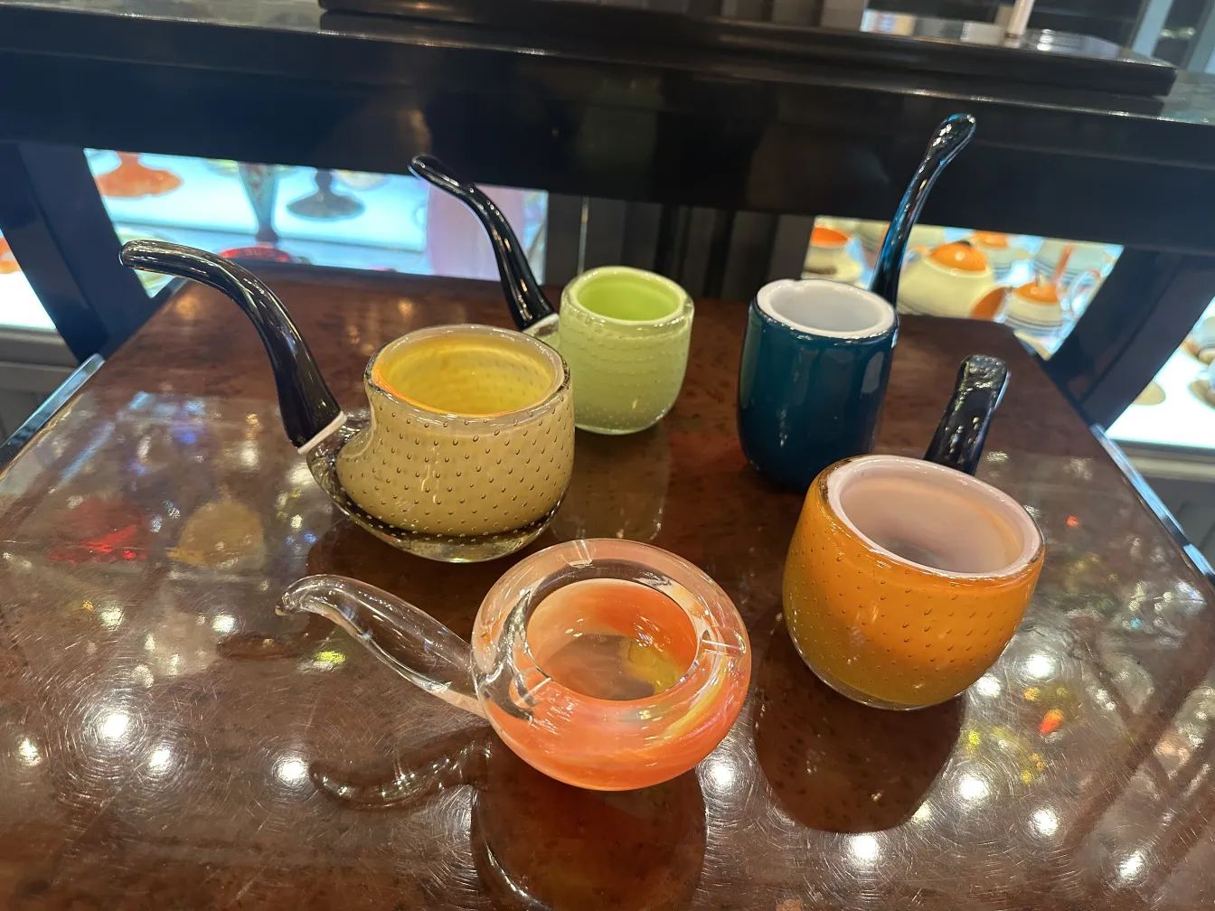 collection of antique murano glass in various colors