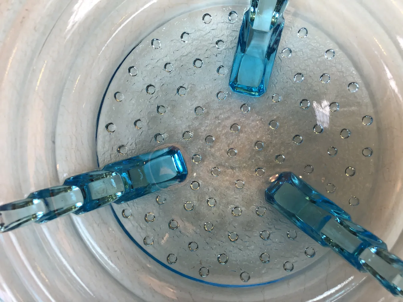 Antique Murano glass with light blue details, elegant decoration.