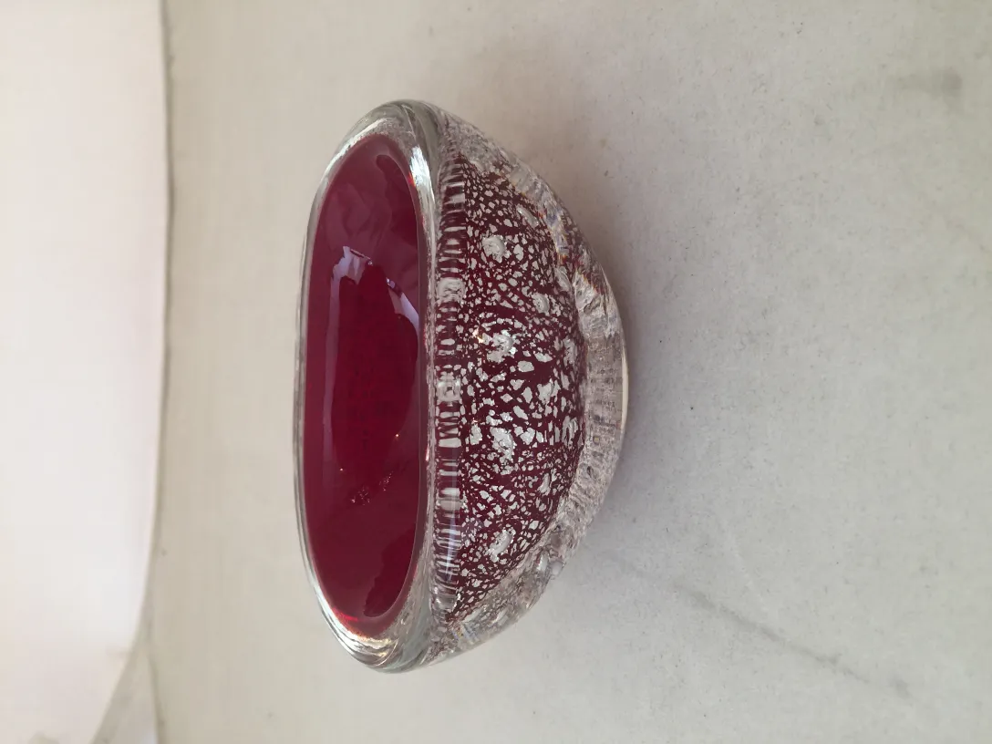 detail of an ancient murano glass in red and white