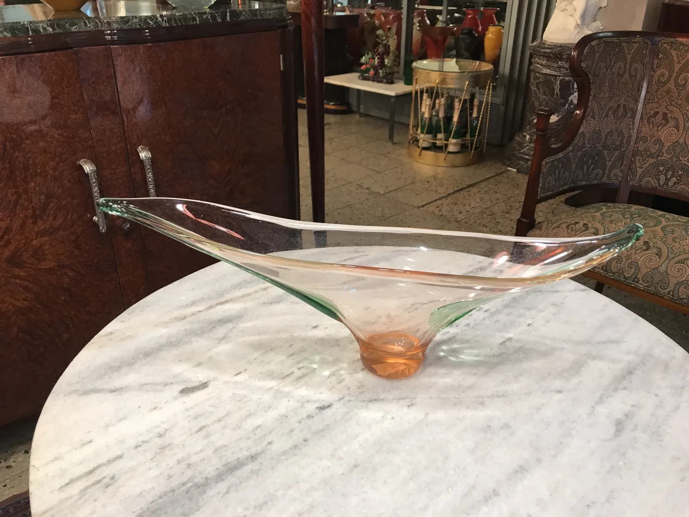 antique murano glass vase with vibrant colors in an antique setting