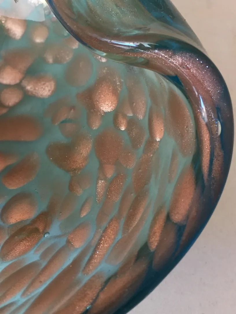 antique murano glass in shimmering blue tones