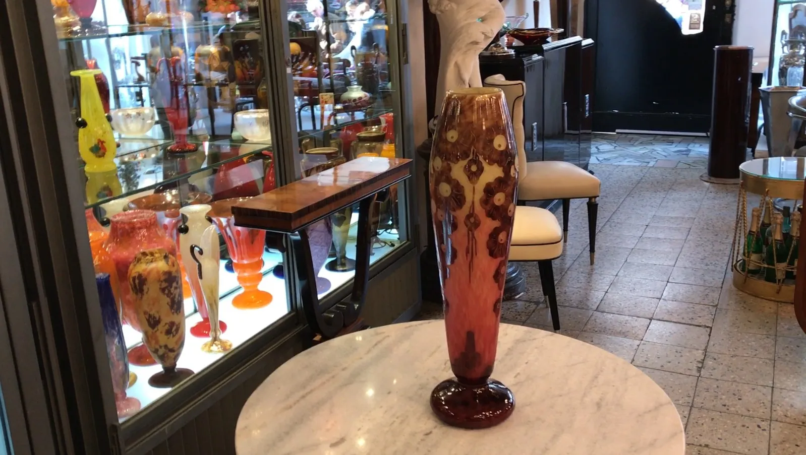 Beautiful signed glass Le Verre in a colorful antique setting.