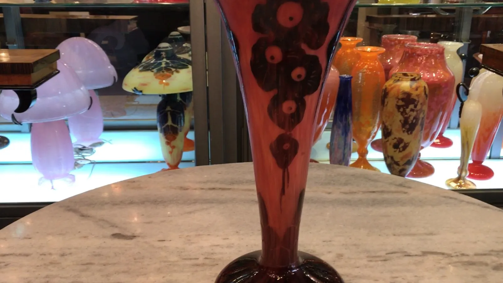 vase with floral design in pink shades, light background