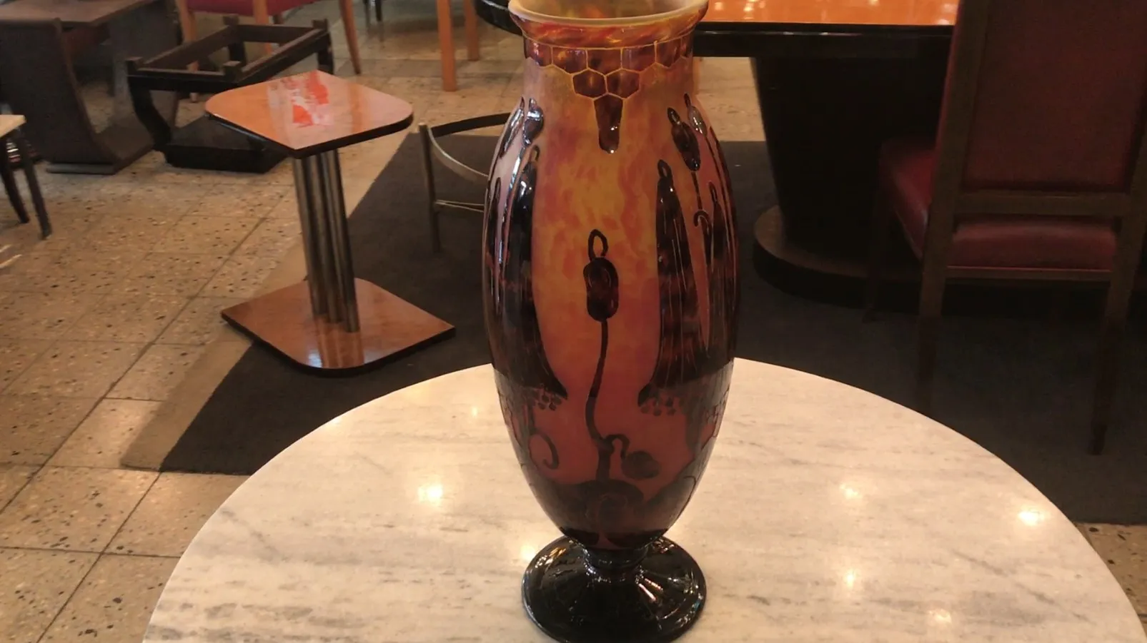 decorative glass vase with warm tones in an elegant setting