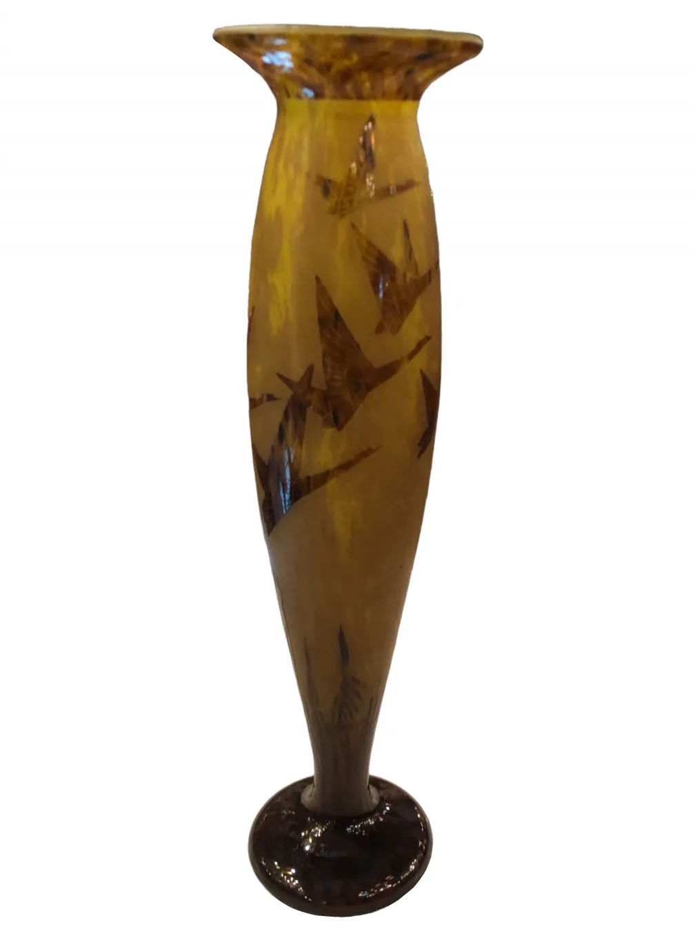 Antique glass vase featuring bird designs in amber color