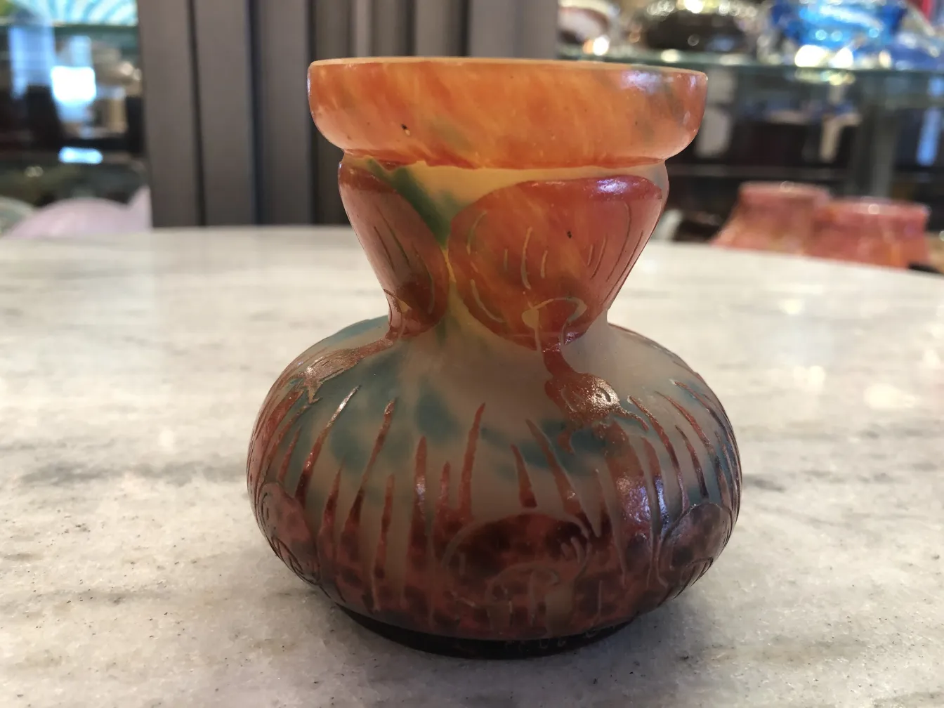 Antique signed glass with colorful decorative details, elegant and unique style.