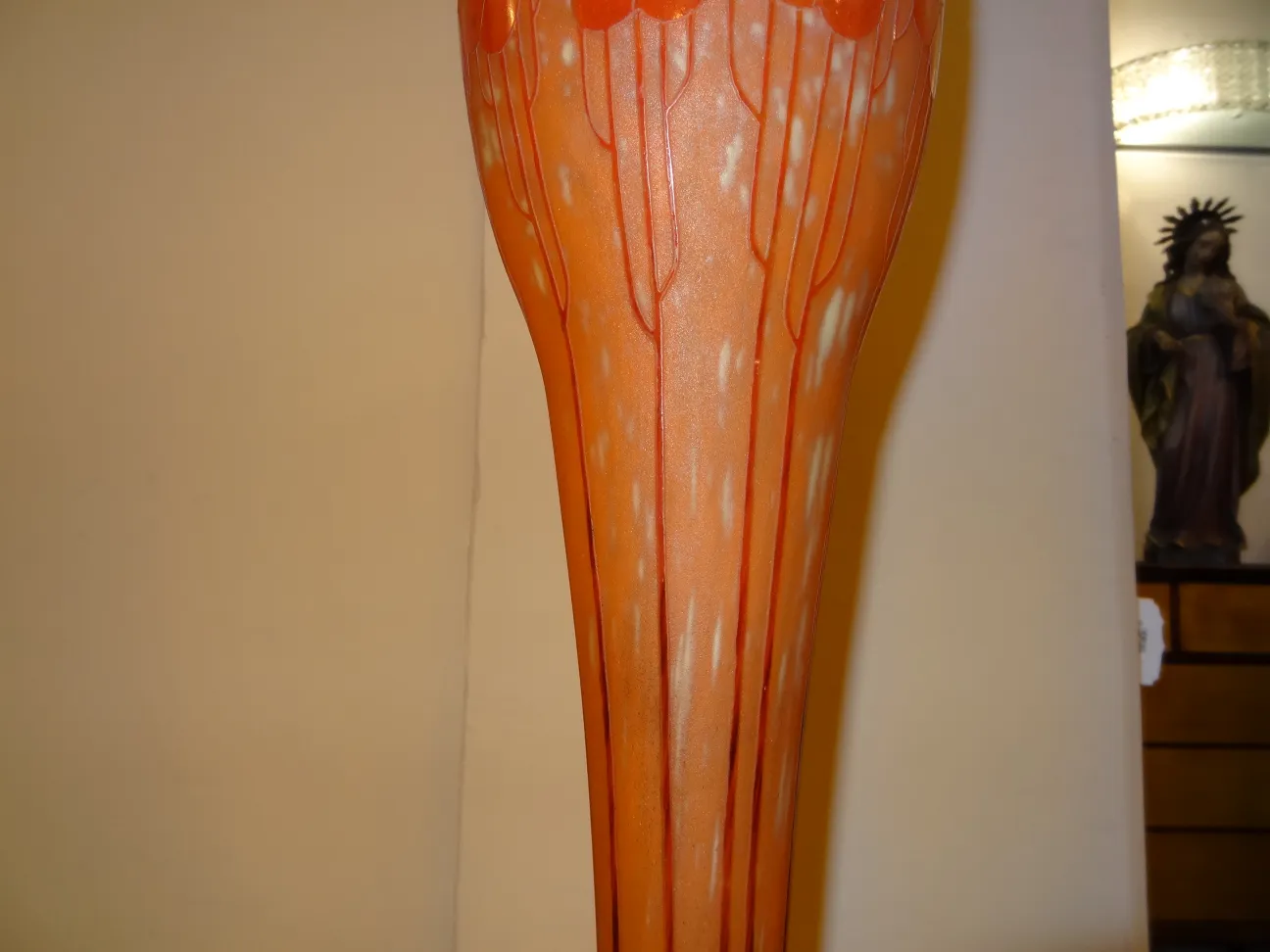 Antique signed glass Le Verre with detailed vibrant design, in a suitable display room.