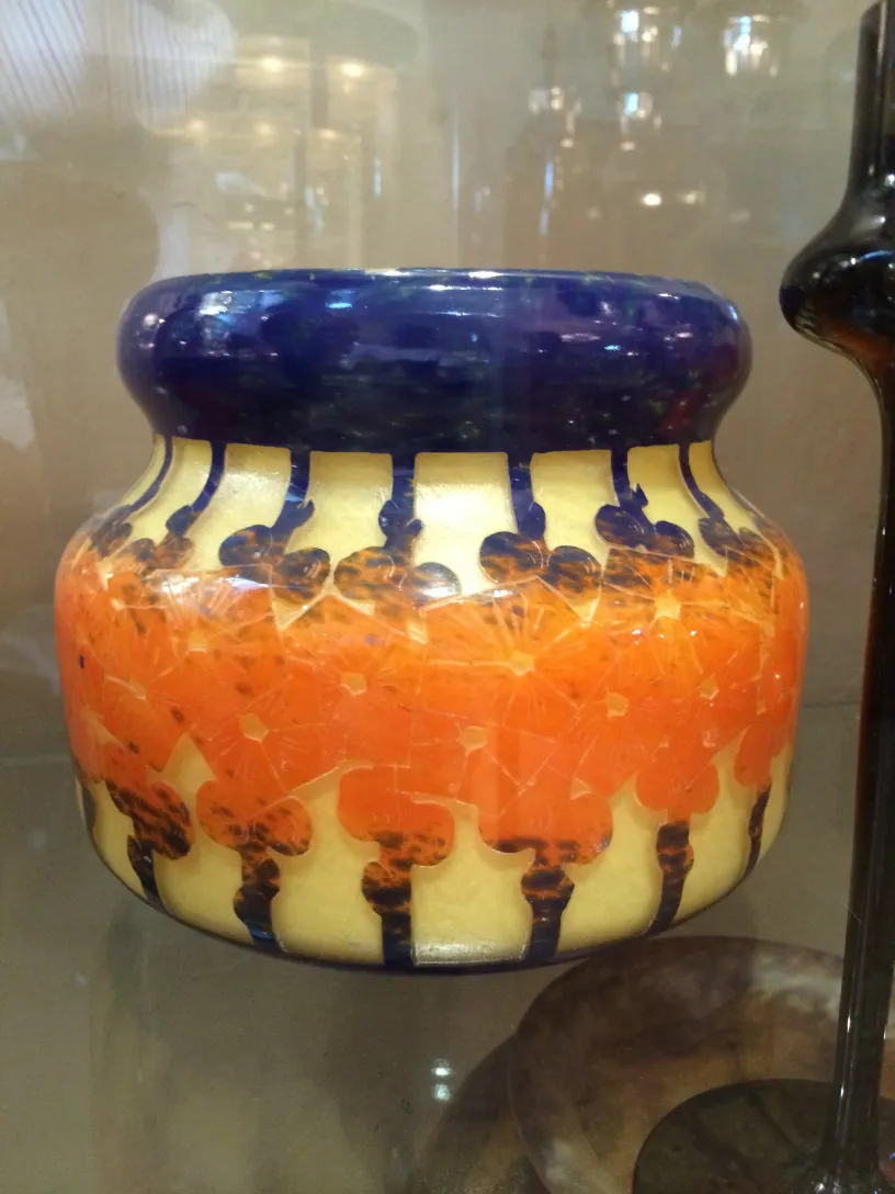 antique glass cup signed le verre with colorful design