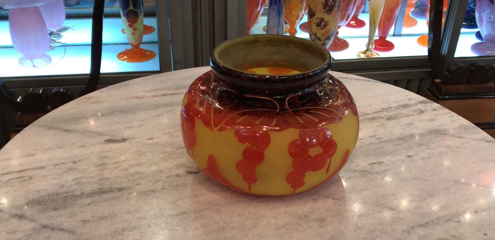 SIGNED GLASS Le Verre with vibrant color patterns on a soft background, part of an antique collection.