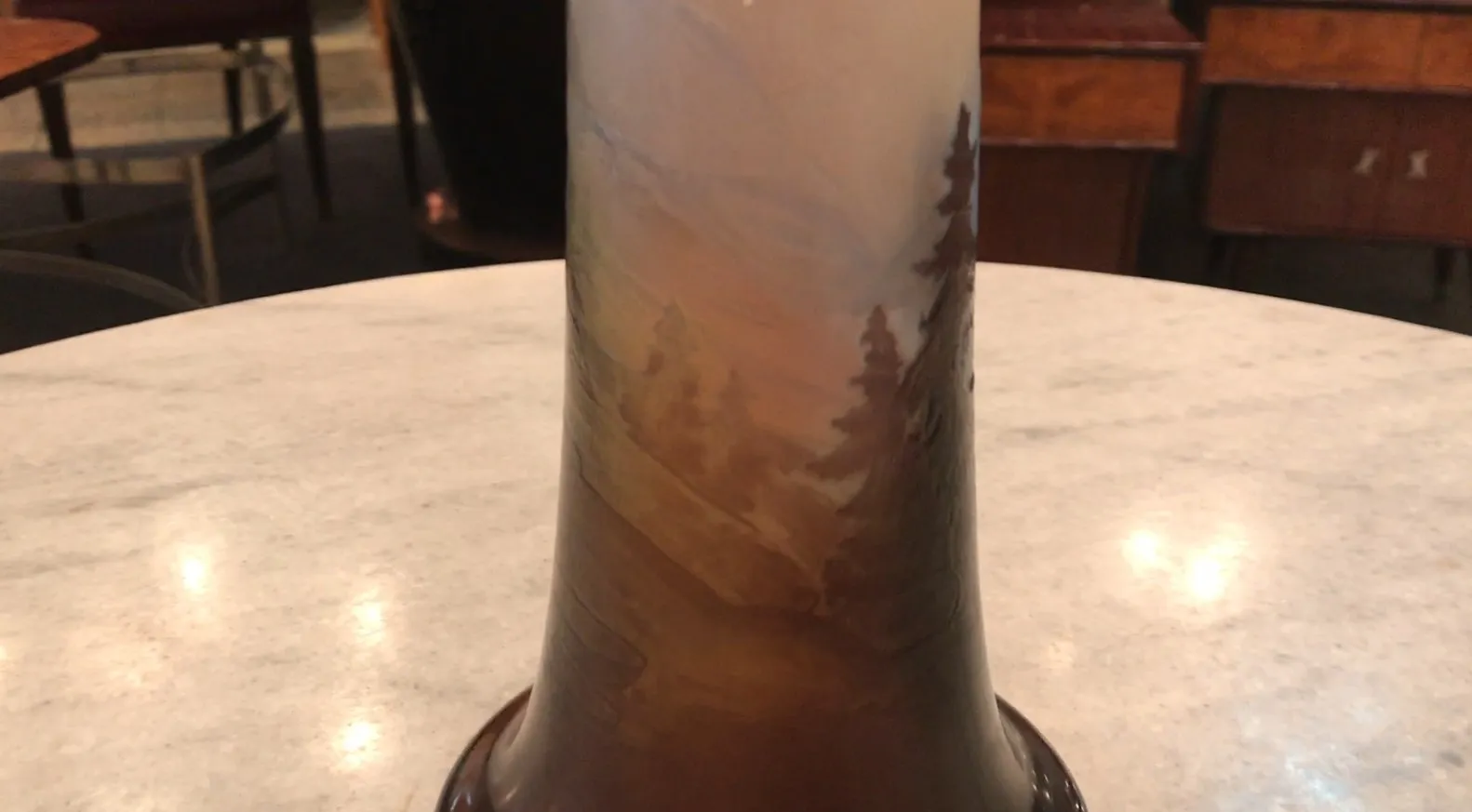 Signed Gallé glass with soft landscape design.