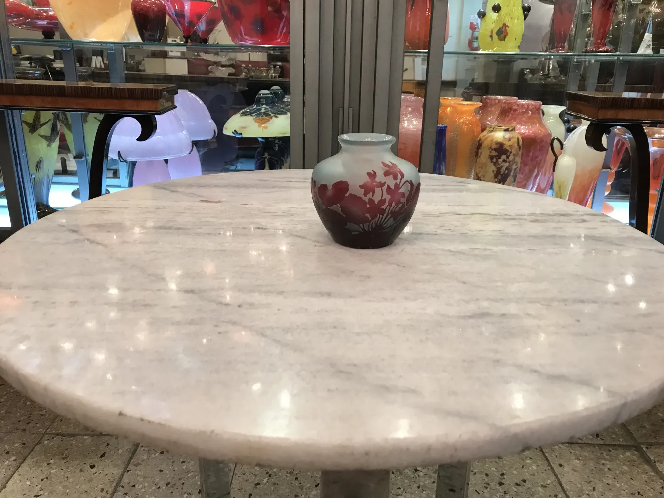 Antique signed glass Gallé with floral decoration, displayed on a table
