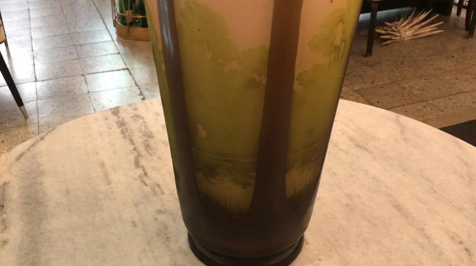 signed glass Gallé with natural decoration and green color, antique setting.