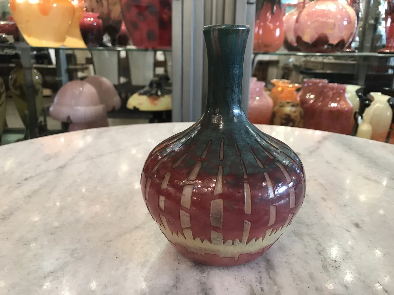 Antique decorative glass bottle with vibrant colors