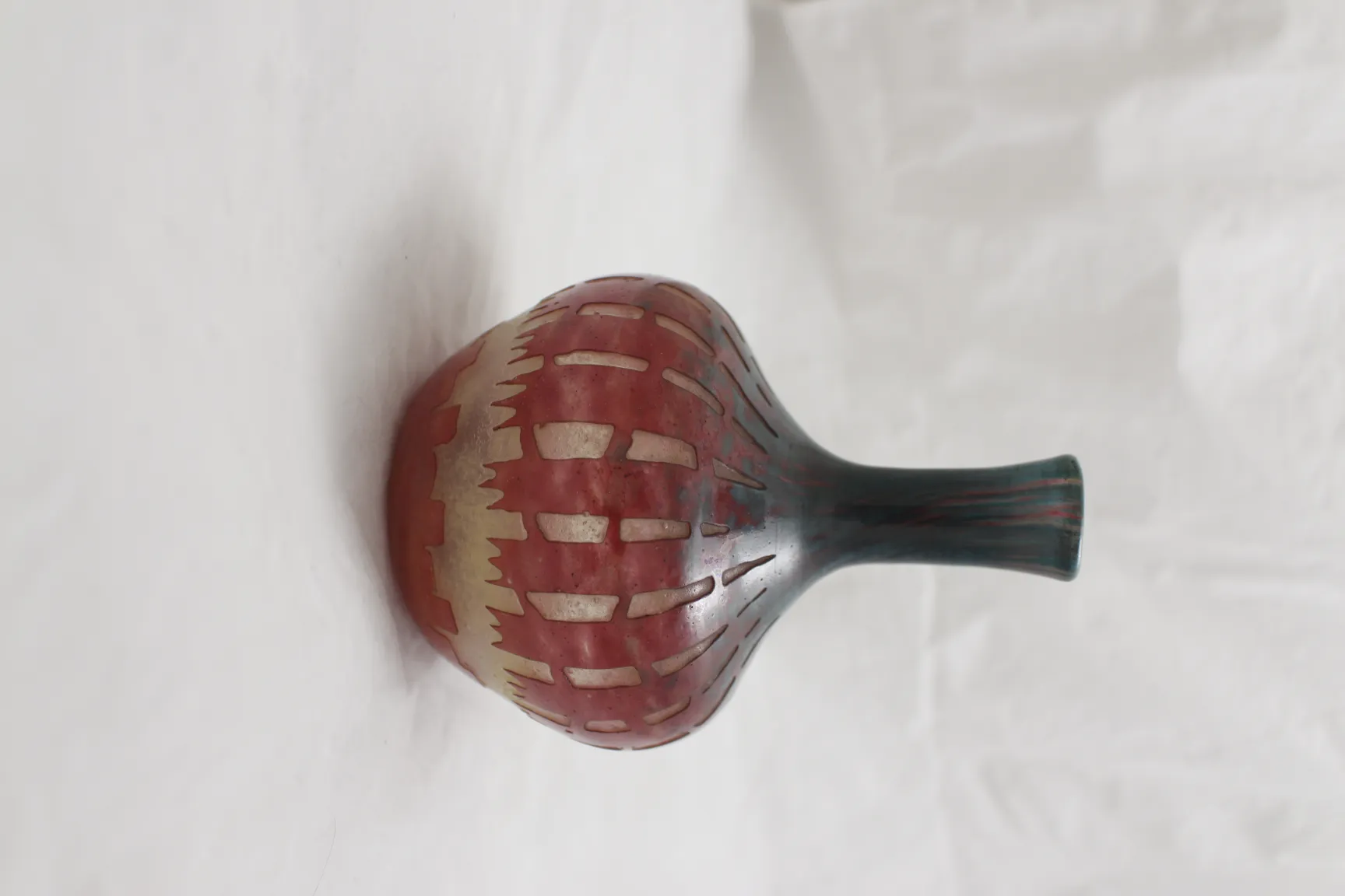 antique signed glass in warm colors with candy and flag designs