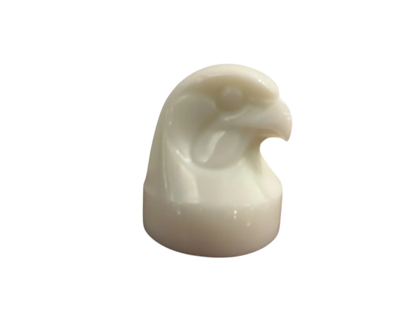 signed glass in the shape of an eagle in an antique setting