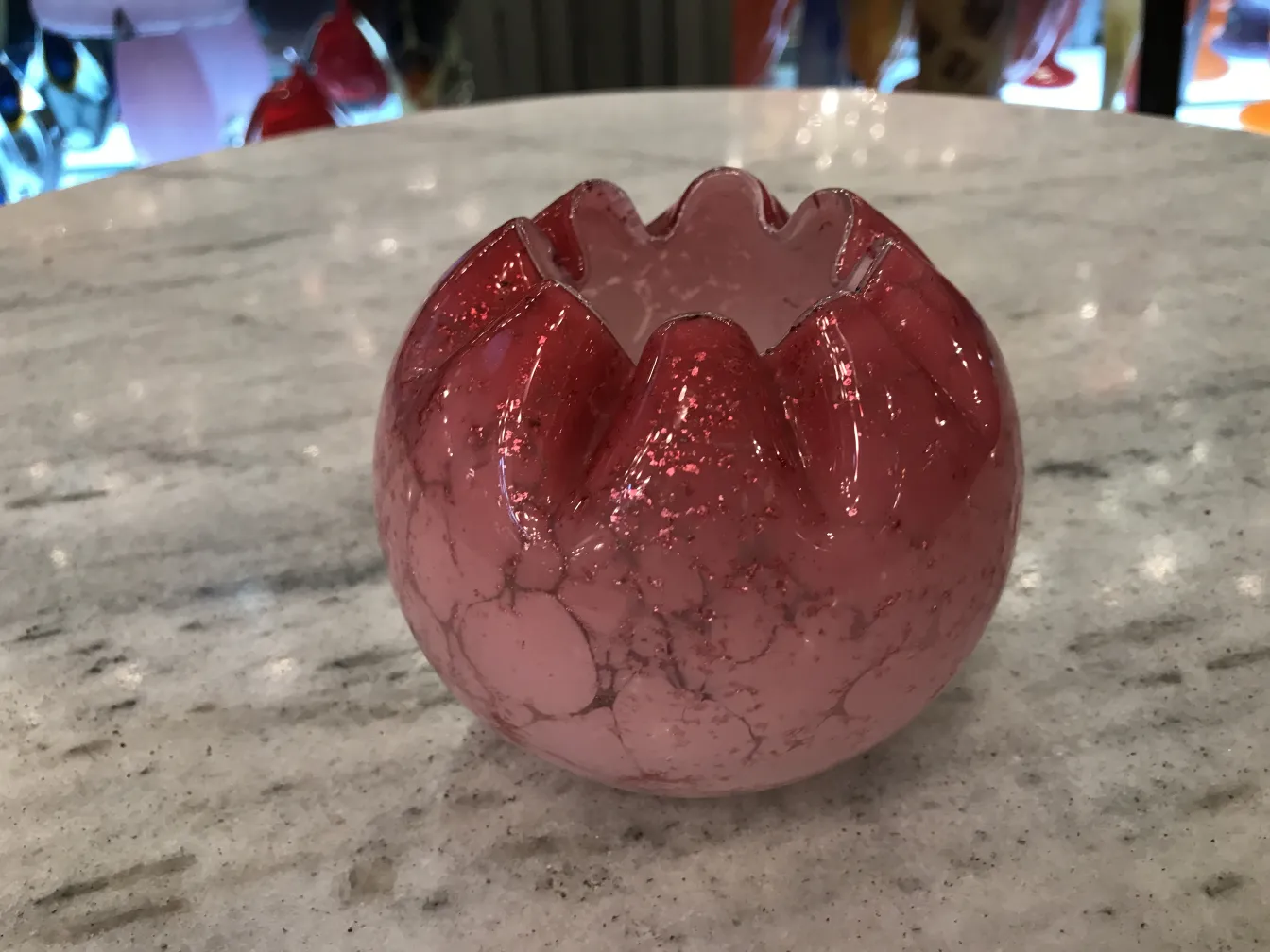 Antique signed glass in pink with a clear texture.