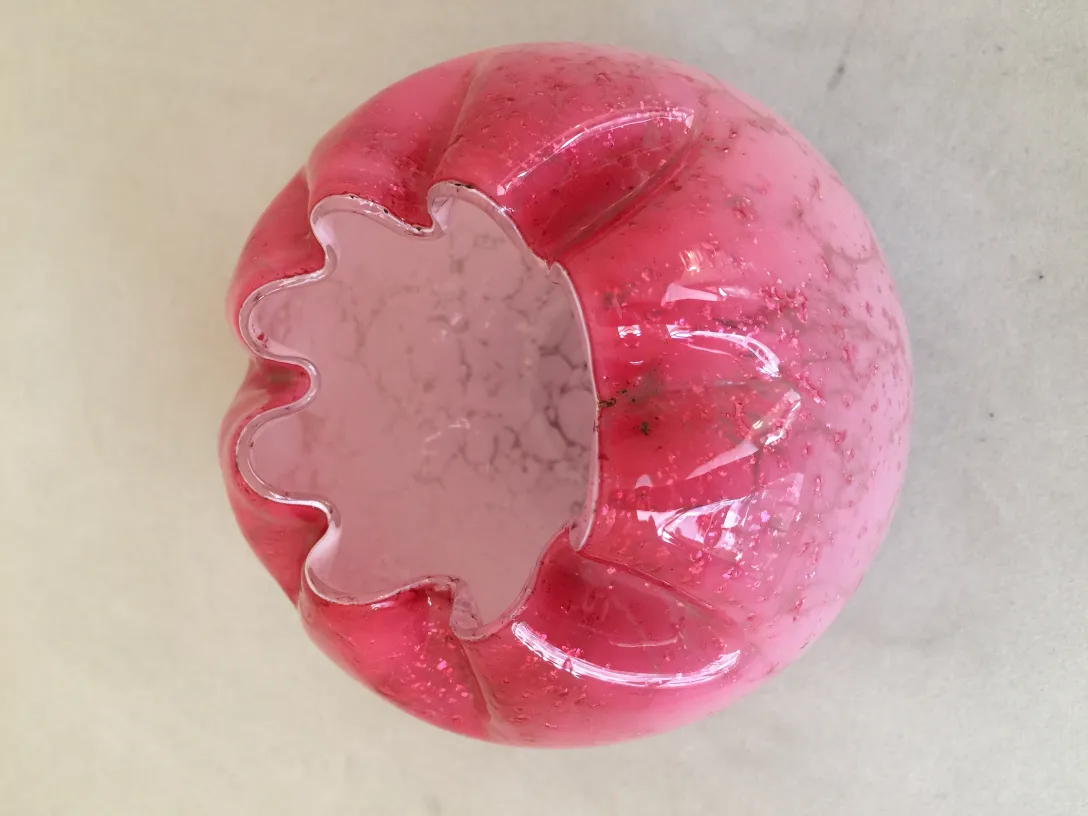 antique signed glass piece in pink with wavy shape