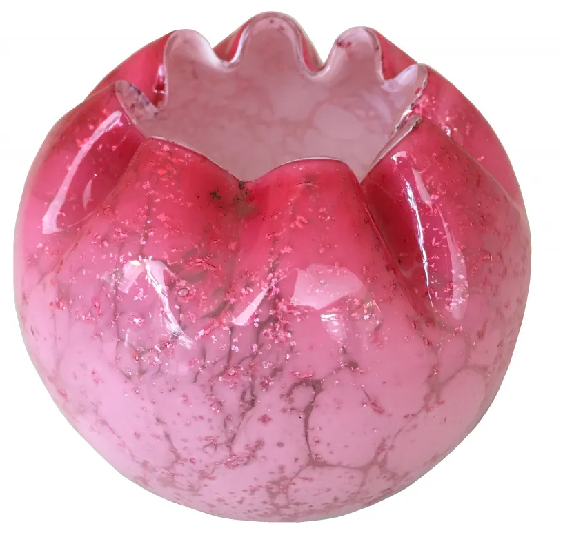 Signed glass in pink with a shiny texture and wavy design at the top.