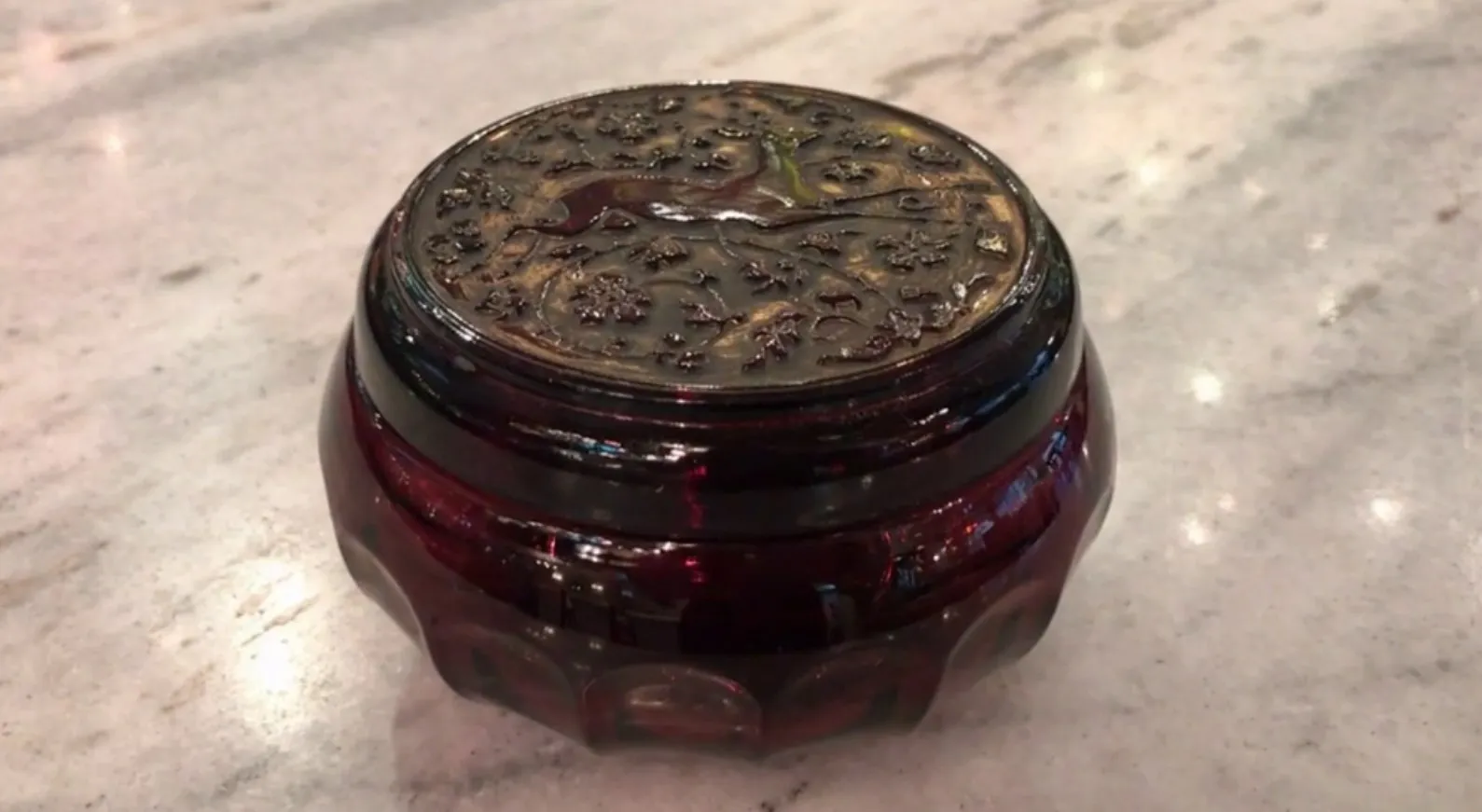 Antique signed glass with intricate decorative lid