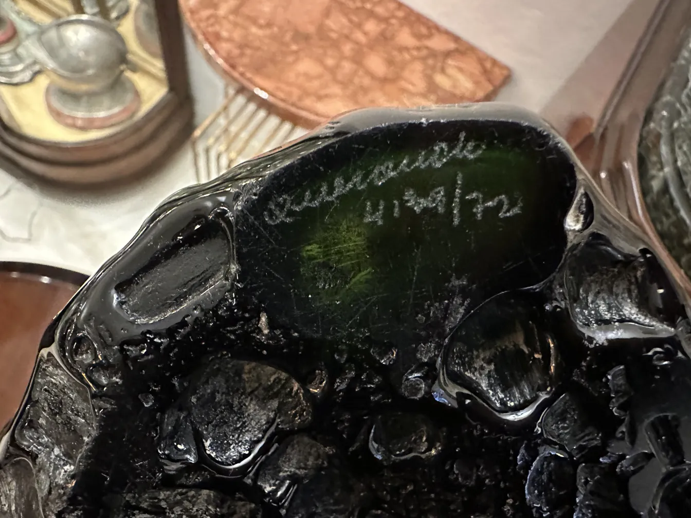 antique glass with a clear signature on its base