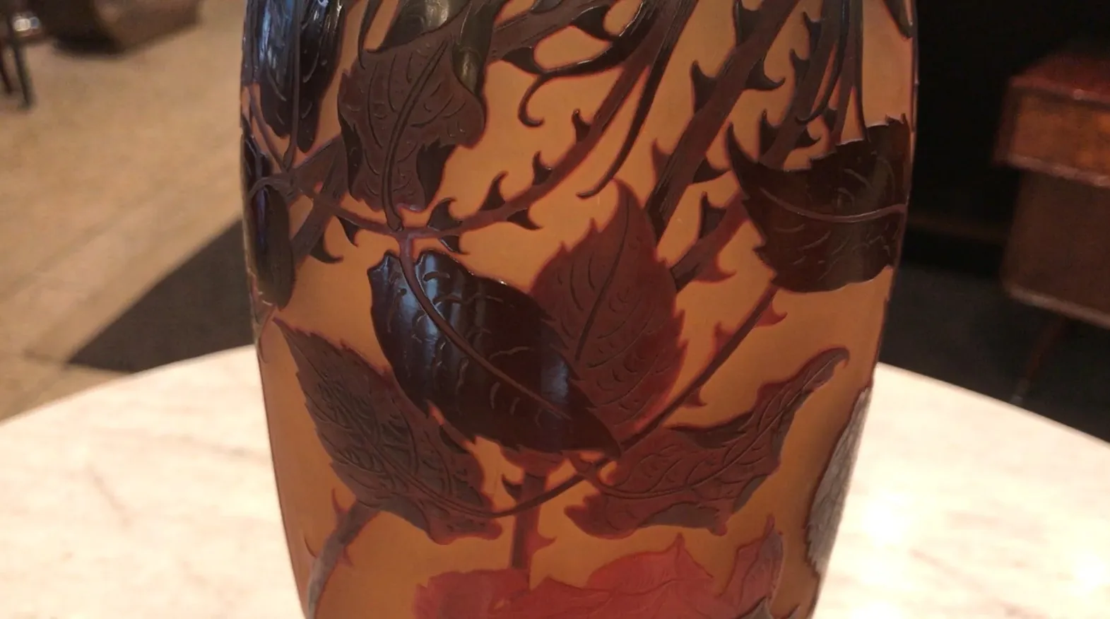 Signed glass D'Argental with decorative motifs in warm tones