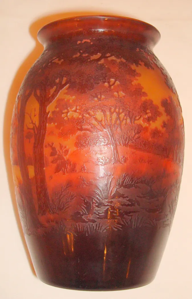 signed glass d'argental with carved landscape on the surface
