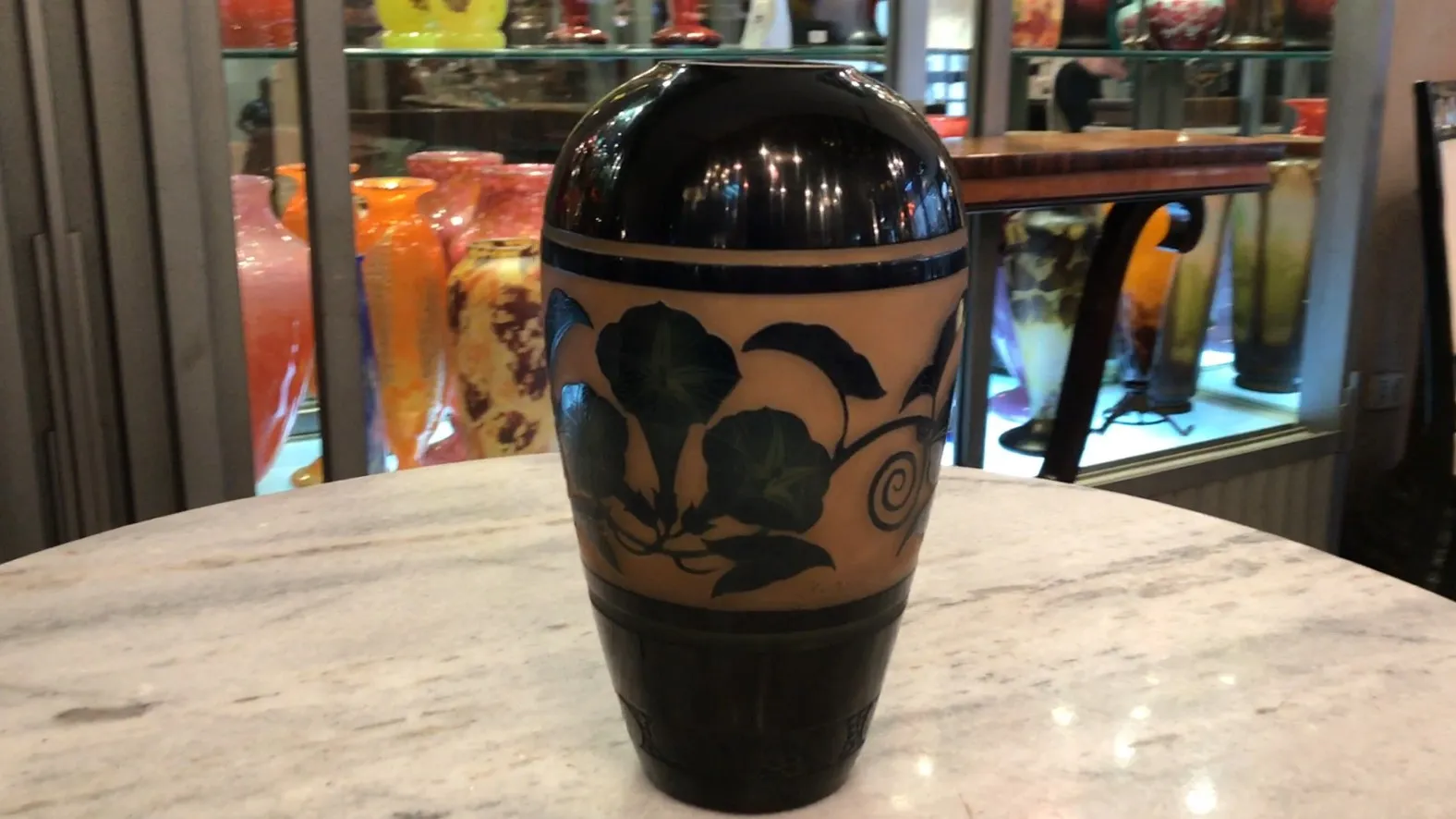 antique glass with botanical design and dark colors