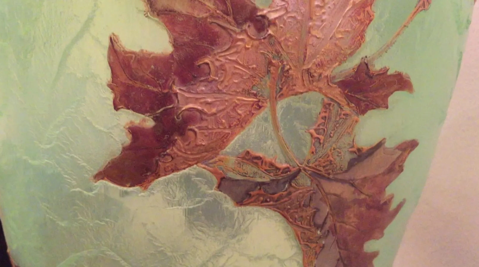 Signed Legras glass with dried leaves on light background, antique.