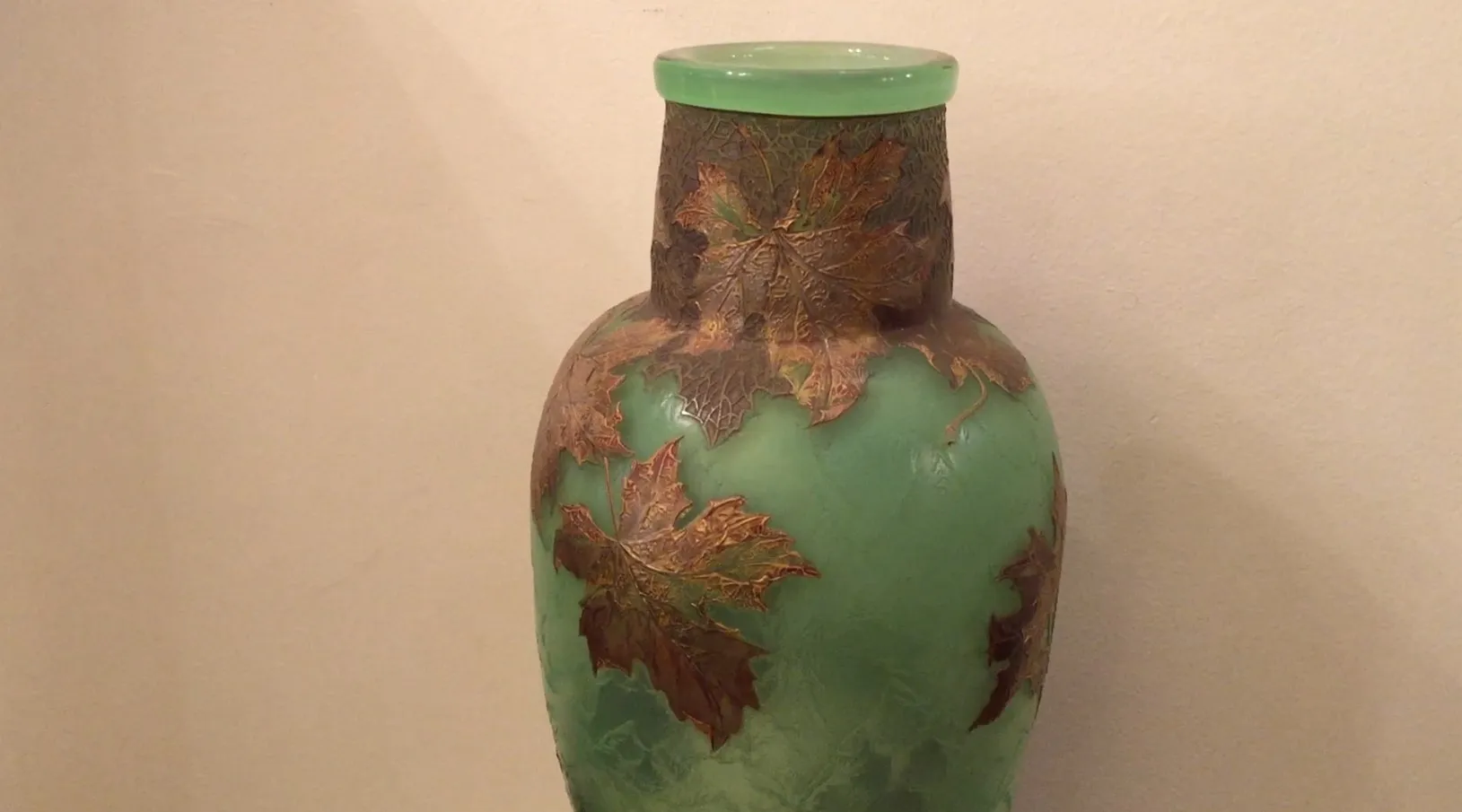 Antique signed glass LEGRAS featuring a golden and green leaf design.